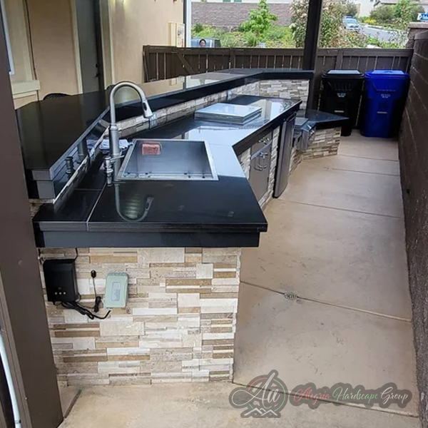 Backyard patio and outdoor living project by Alegria Hardscape Group