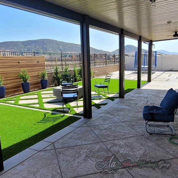 Luxury outdoor patio by Alegria Hardscape Group