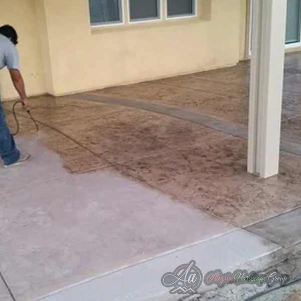 Concrete patio and paver installation by Alegria Hardscape Group